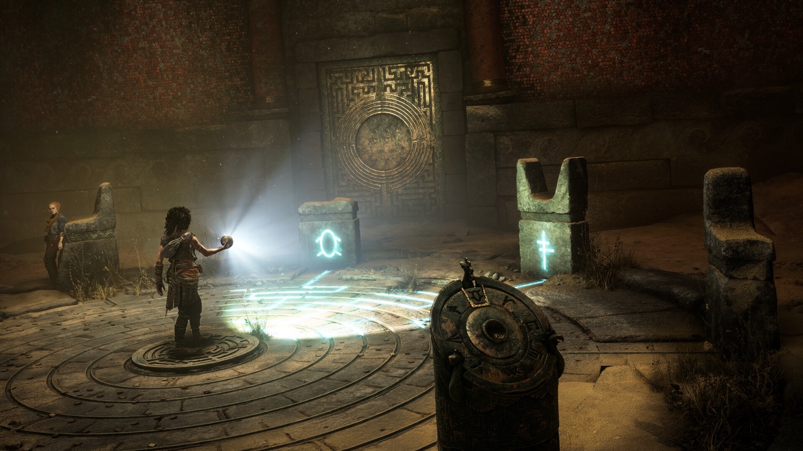 Sophia holds a luminous Minoan sphere inside a dark stone chamber where cyan symbols and light paths glow across a circular floor mechanism.